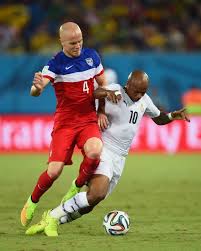 NATAL, BRAZIL - JUNE 16: Michael Bradley of the United States and Andre Ayew of Ghana battle for the ball during the 2014 FIFA World Cup Brazil Group G match between Ghana and the United States at Estadio das Dunas on June 16, 2014 in Natal, Brazil. (Photo by Jamie McDonald/Getty Images)